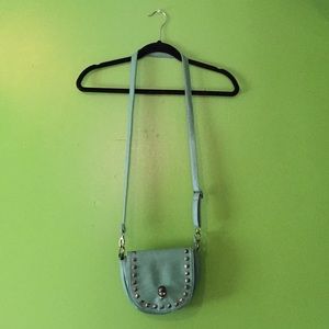 Teal skull shoulder bag